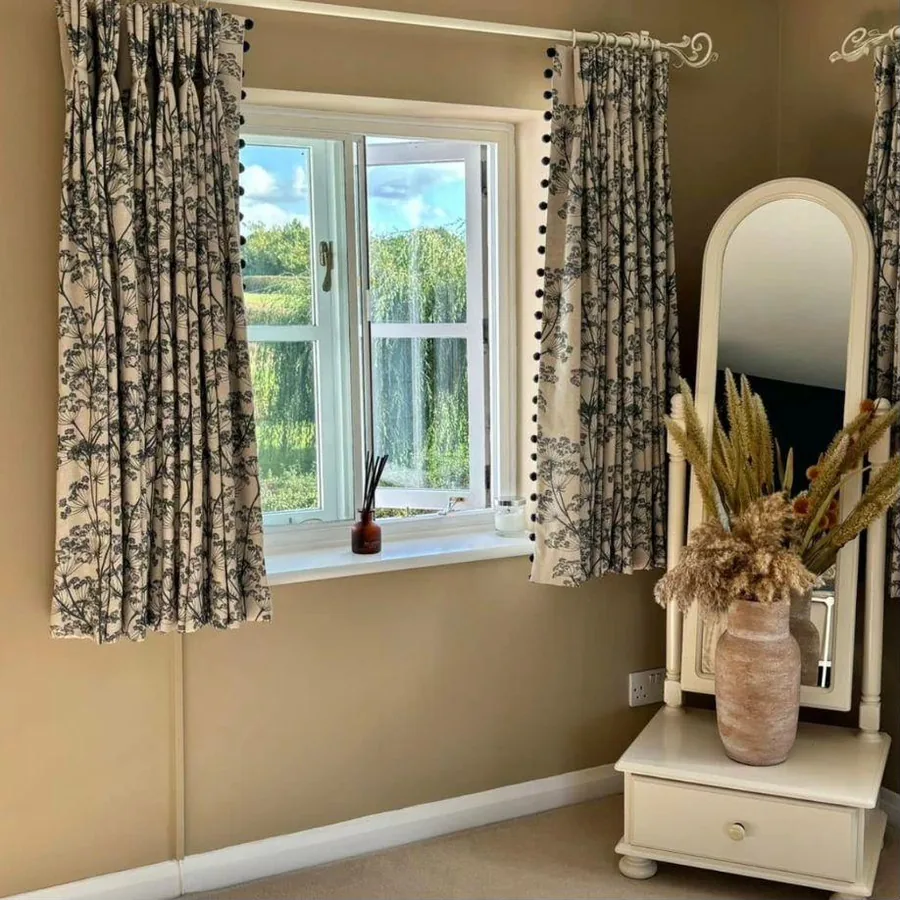 Made-to-measure interlined curtains with pom-pom trim
